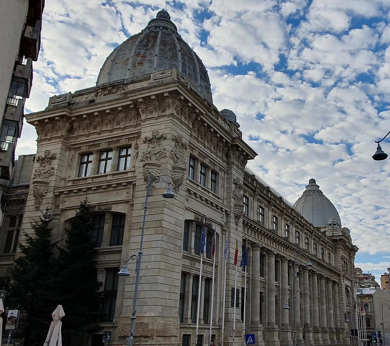 The neoclassical former Postal Palace, now the National Museum of Romanian History, with its colonnaded portico on Calea Victoriei in Bucharest